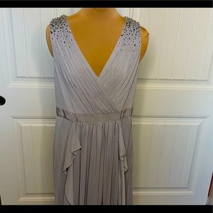 Adrianna Papell Silver V-Neck Tulle Cascade gown.